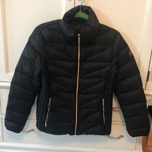 Black Michael kors down jacket, size large.